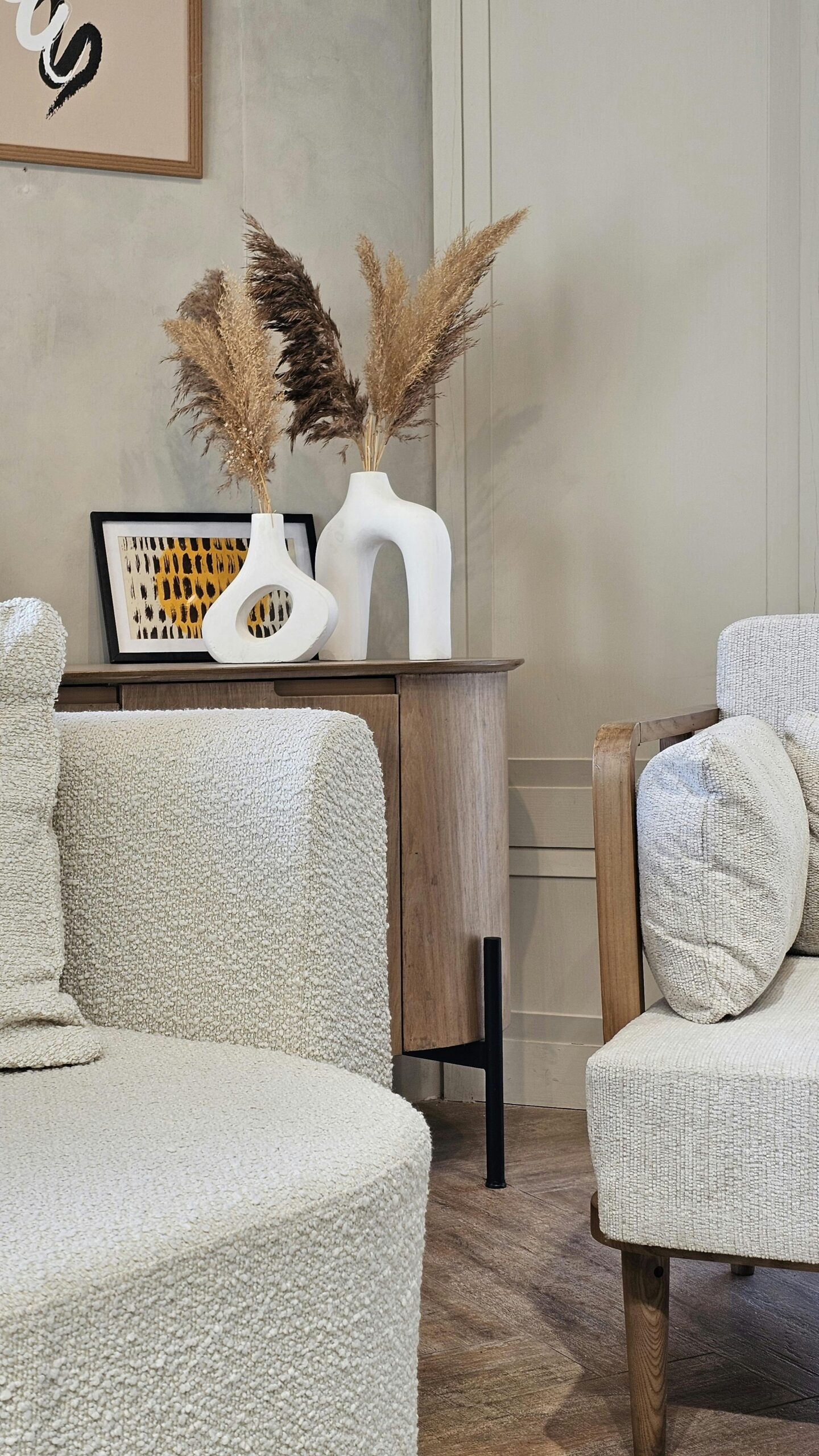 A stylish modern living room with minimalist furniture and decor accents.